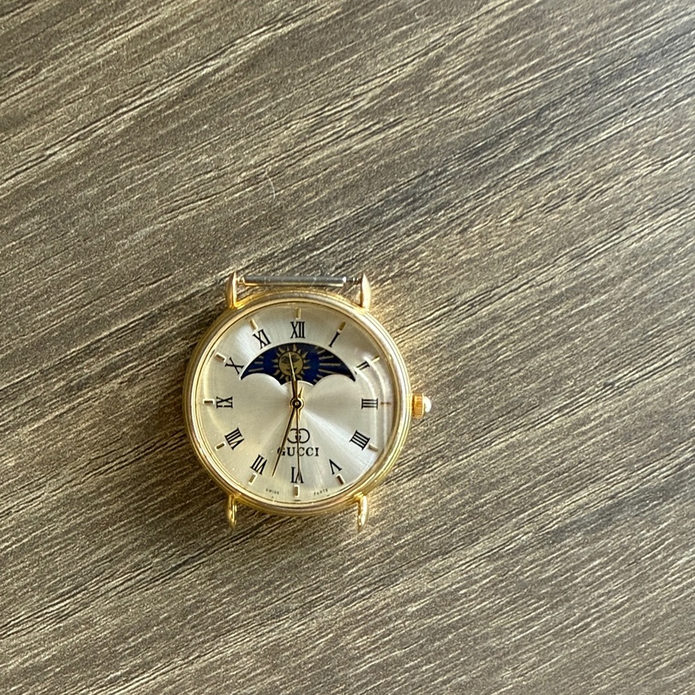 Gucci Gold and Silver watch with Blue Moonphase